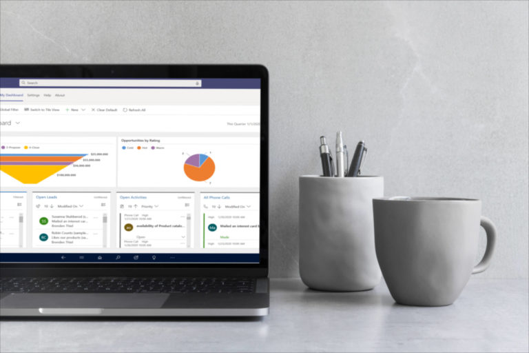 microsoft sales screenshot in view of macbook pro mockup on the gray table