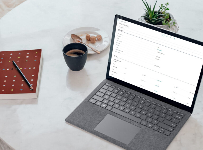 nc365 urlaubsplanner microsoft surface latop mockup on the marble table
